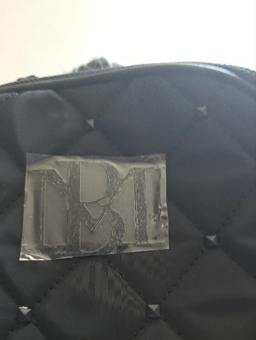 Badgley Mischka Black Quilted Backpack with Black and White Tweed Pocket